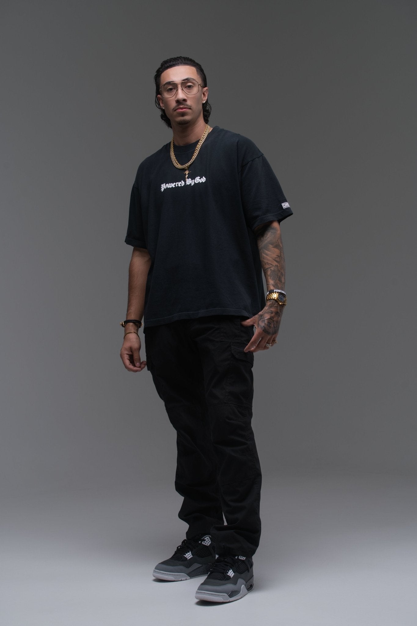VINTAGE BLACK POWERED BY GOD TEE - FoundNation