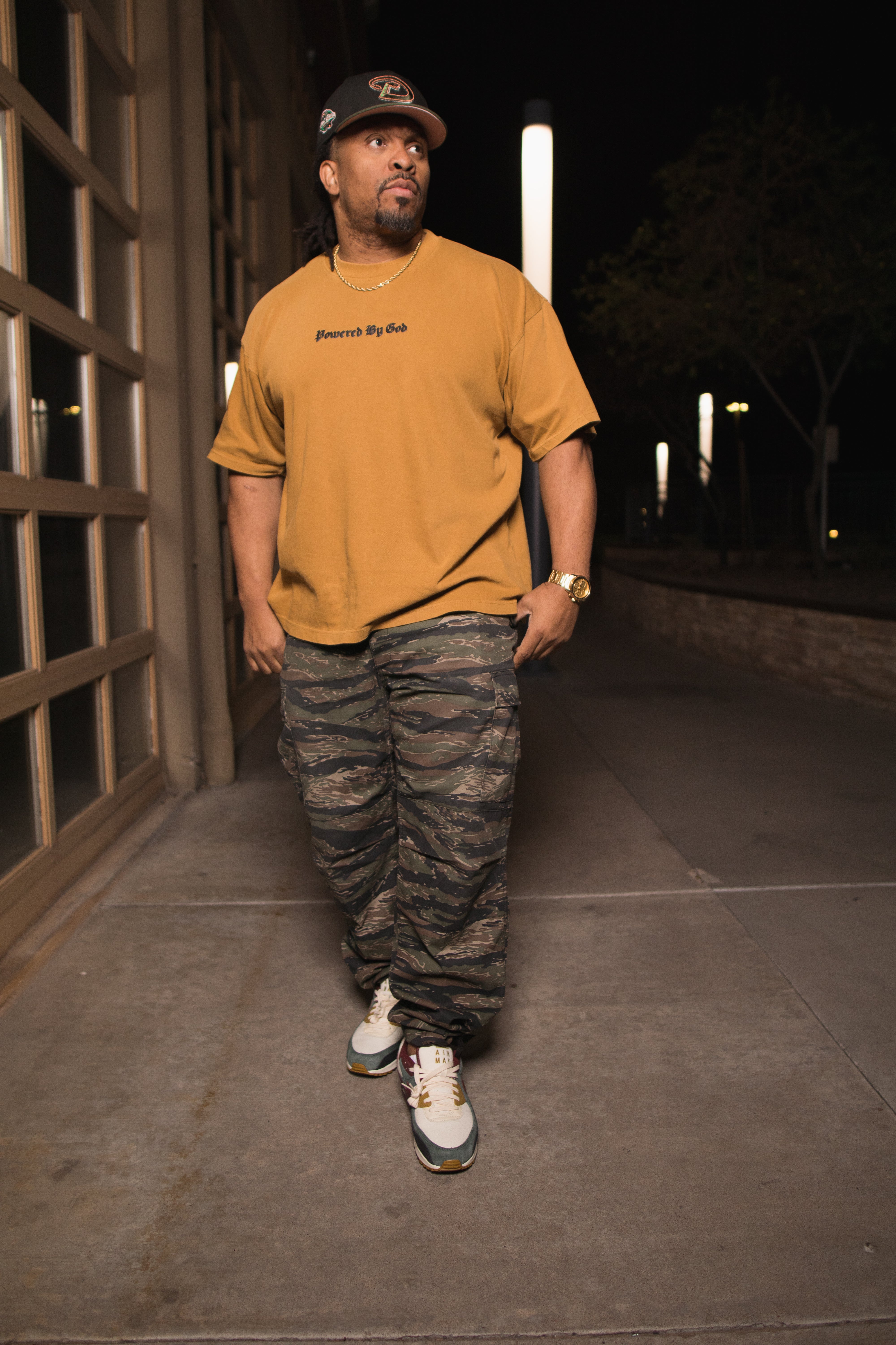 GOLD POWERED BY GOD TEE